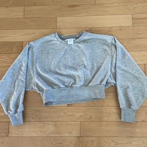 Grey cropped TNA sweatshirt